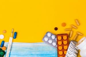 https-www-napolilaw-com-wp-content-uploads-pills_on_yellow_background-300x200-jpg