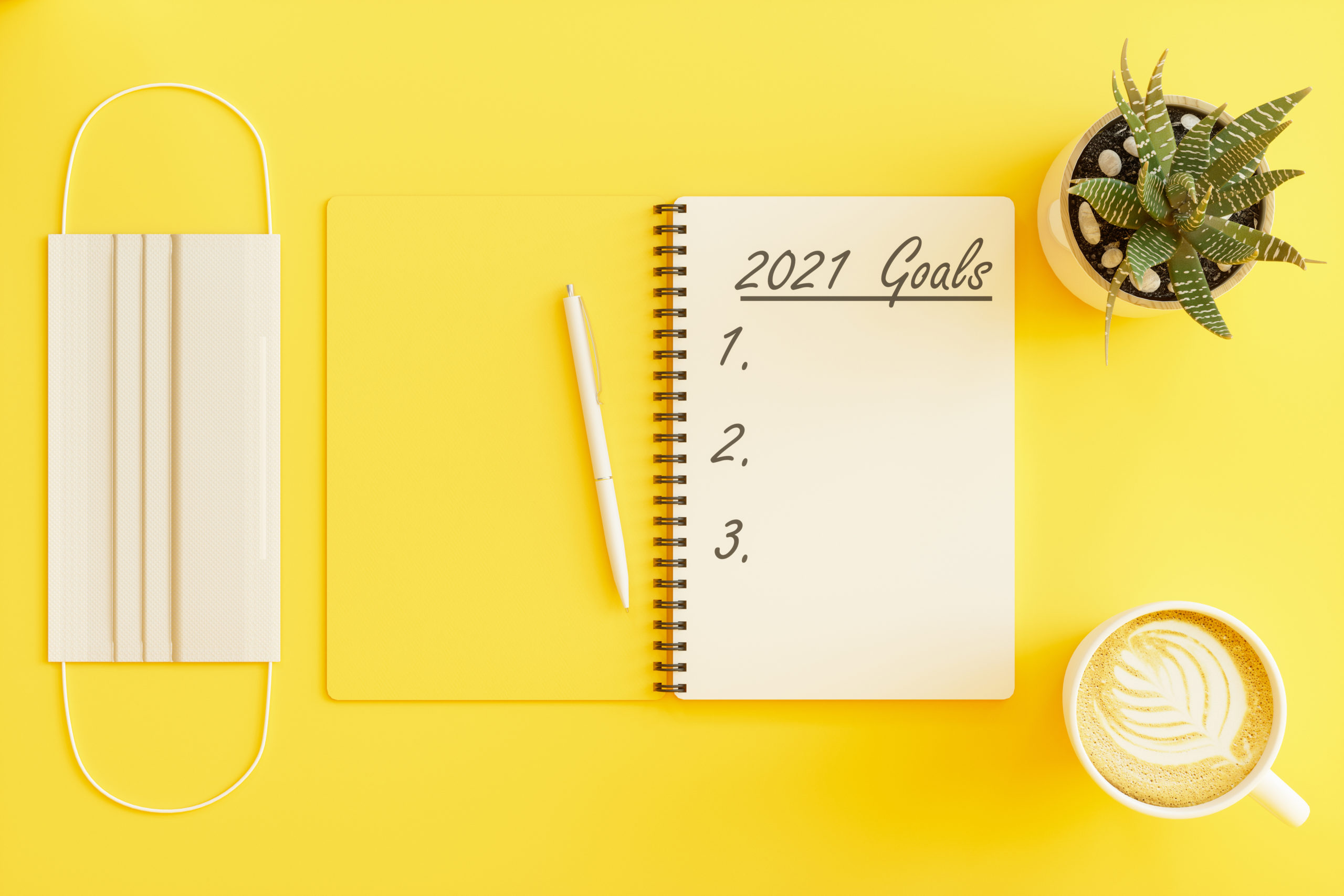 2021 New Year Goal Concetps. Office Supplies with Medical Mask.