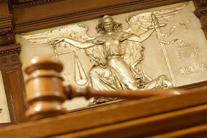 Gavel and Figure of Justice