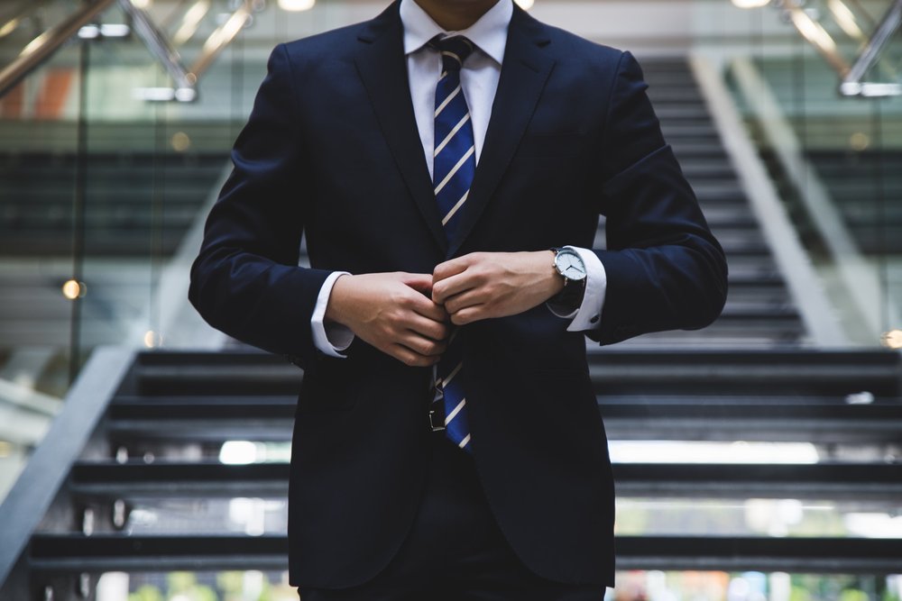A man dressed in a suit.
