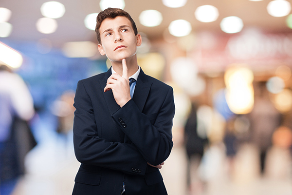 person with hand on chin