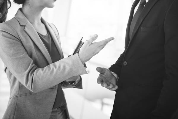 two people speaking to each other
