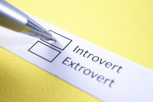 close up of pen checking box next to the word introvert