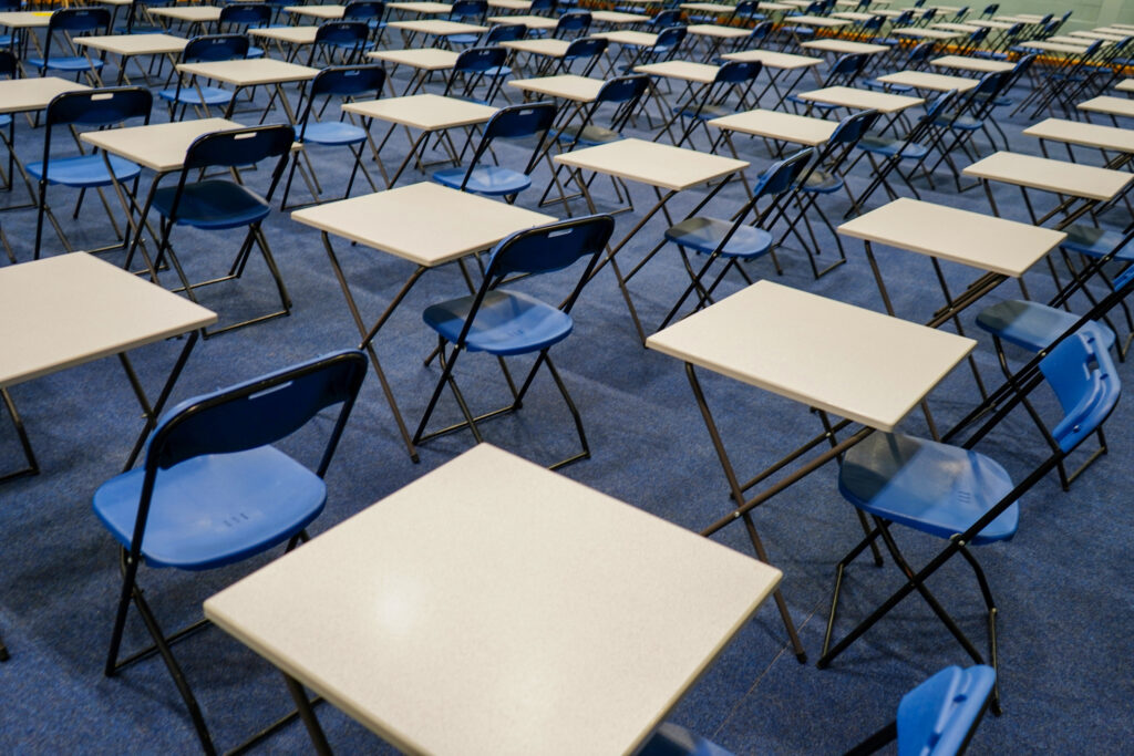 bar exam alternative, Chairs and desks in an exam hall