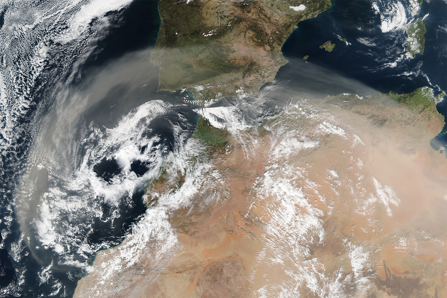 Satellite image of a dust storm moving across North Africa and Europe. These types of storms are not only more intense due to climate change, but can last longer and cover more territory.
