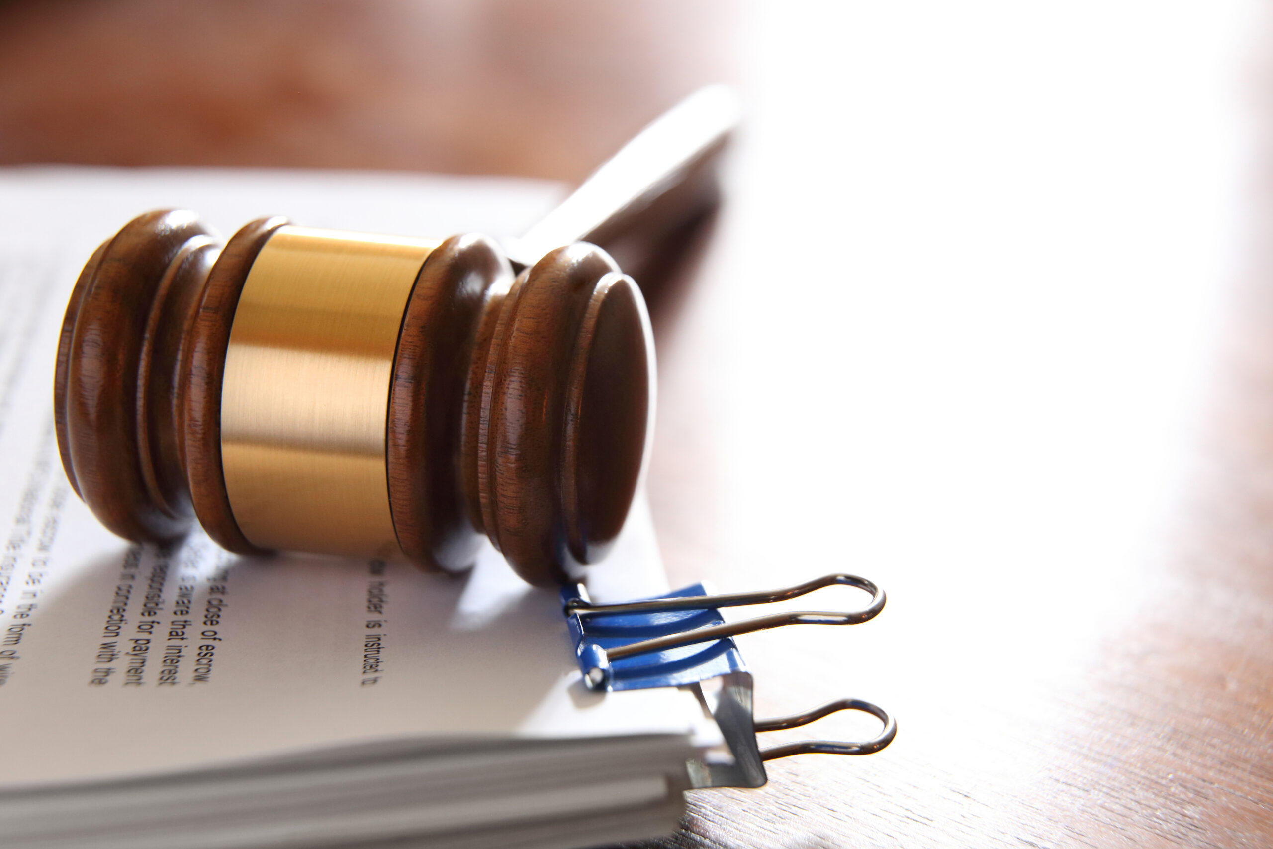 Gavel On Stack Of Legal Documents