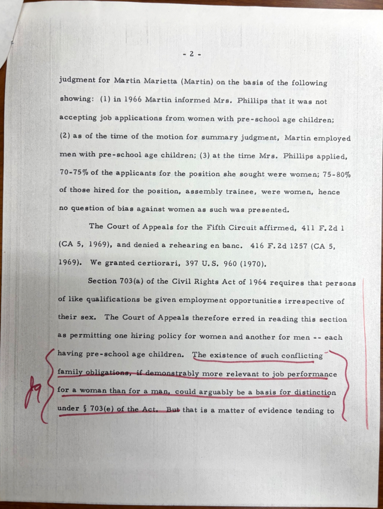 Photo of a draft of the Phillips decision with red underlining in one section by Justice Marshall.